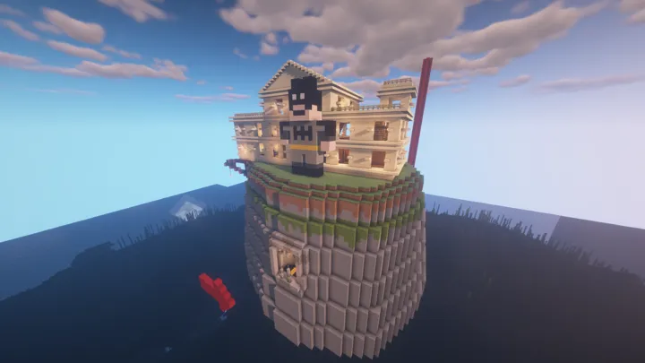 Et mesterlig byggverk av et hus på en høy mur. Bilde fra Minecraft